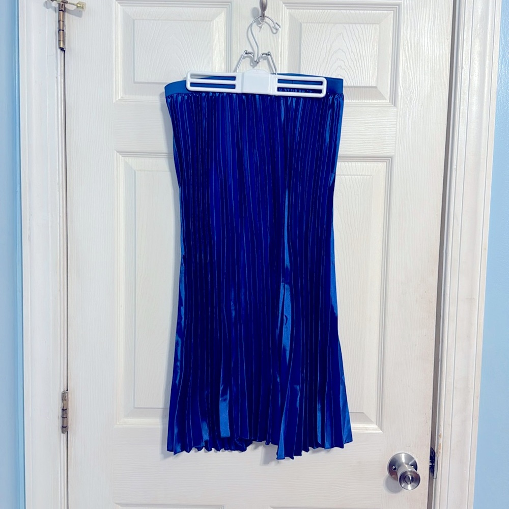 Solid Pleated Metallic Royal Blue A Line Skirt. Elastic band waist.